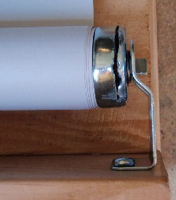 removing pawl locking mechanism from roller shade removing pawl locking mechanism from roller shade