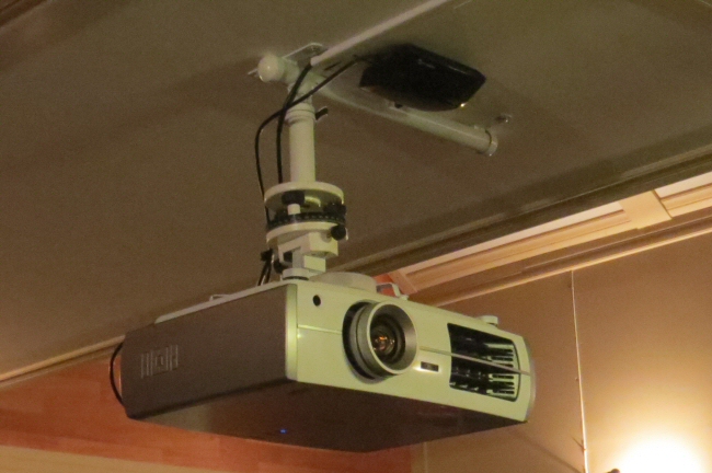 the ultimate home theater uses our CurtainCloser system with Epson triple LCD projector