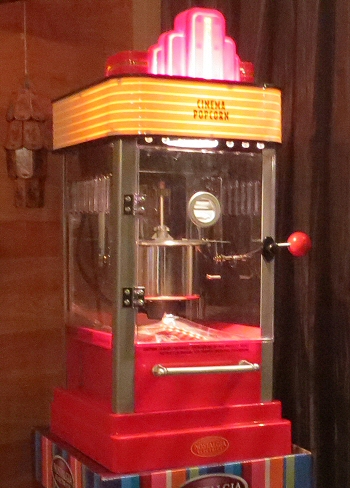 the ultimate home theater is equipped with an absolutely authentic popcorn machine
